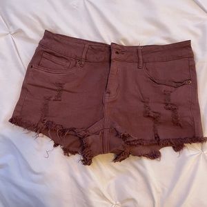 purple distressed jean shorts